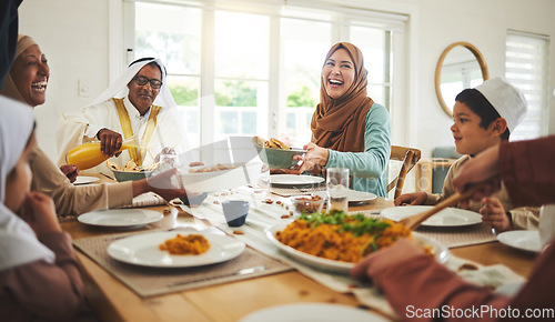 Image of Food, funny and muslim with big family at table for eid mubarak, Islamic celebration and lunch. Ramadan festival, culture and iftar with people laughing at home for fasting, islam or religion holiday