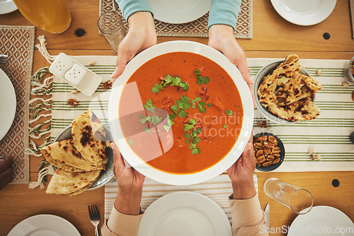 Image of Food, Eid Mubarak and dish for family at table for Islamic celebration, festival and lunch together. Ramadan, religion and above of hands with meal, feast and cuisine for fasting, holiday and culture