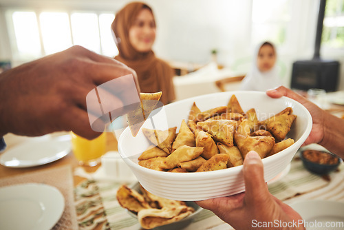 Image of Food, samosa and muslim with hands of people at table for eid mubarak, Islamic celebration and lunch. Ramadan festival, culture and iftar with closeup of family at home for fasting, islam or religion