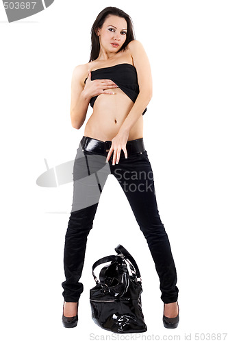Image of The sexy young woman in a black jeans. Isolated