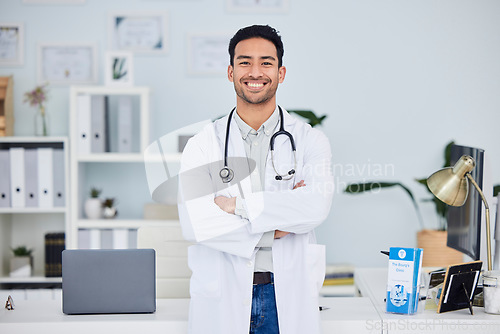 Image of Happy asian man, doctor and arms crossed in confidence of healthcare consultant at the office. Portrait of confident and male person or medical professional ready for health consultation or advice