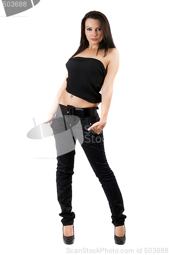 Image of The sexy young woman in a black jeans. Isolated on white