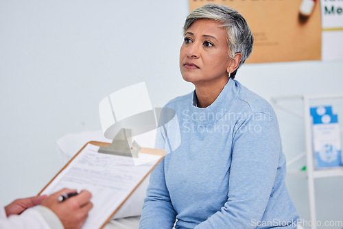 Image of Clipboard, consulting and doctor with patient for healthcare support, elderly exam and insurance policy in hospital. Listening, writing and medical professional, documents and elderly woman in advice