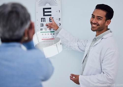 Image of Happy asian man, doctor and eye exam with patient for testing vision, sight or consultation at the hospital. Male person, medical or healthcare professional consulting or helping client with eyesight