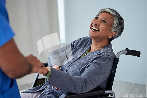 Image of Happy woman with disability in wheelchair holding hands with nurse for support, physical therapy and kindness. Mature female patient smile with caregiver for medical trust, helping and rehabilitation