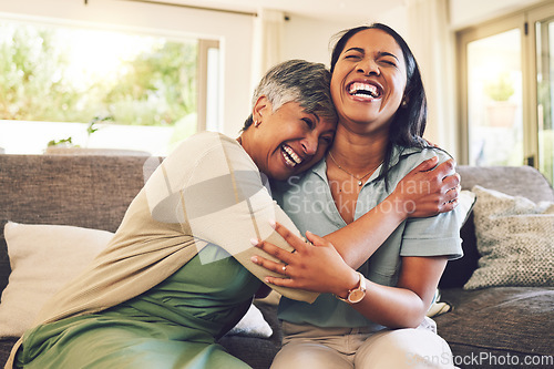 Image of Senior mother, funny and hug woman in living room, bonding and laughing together. Happy, elderly mom and embrace person, relax and smile with care, love and enjoying time on home sofa with family.