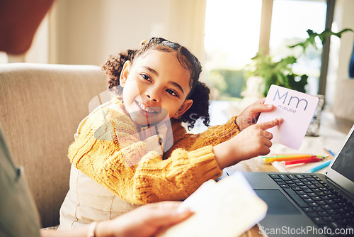 Image of Mom, kid and alphabet card for teaching, spelling and learning for literacy, language and show letter in family house. Letter, mother and daughter with reading, education and support for development