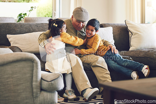 Image of Hug, grandfather or happy kids on a sofa with love enjoying quality bonding time together in family home. Smile, affection or senior grandparent relaxing with young children siblings on house couch