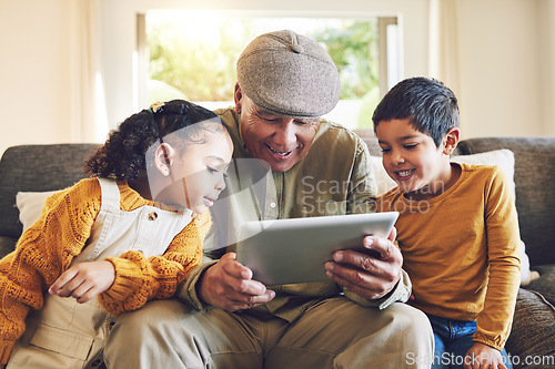 Image of Young kids, grandfather and tablet, relax together and watch cartoon or e learning with games while at home. Bonding, love and spending quality time, old man and grandkids with gadget and internet