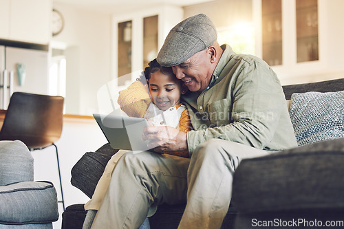 Image of Girl kid, grandfather with tablet on sofa and relax together, watch cartoon or elearning games at home. Bonding, love and spending quality time, old man and female child with gadget and internet