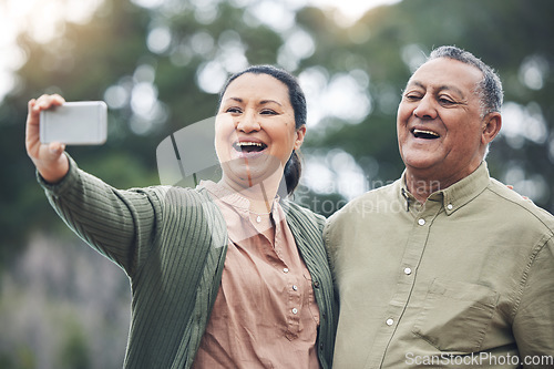 Image of Happy senior couple, selfie and laughing for photo, picture or memory together in nature outdoors. Elderly man and woman smile for social media, online post or vlog in happiness for capture outside