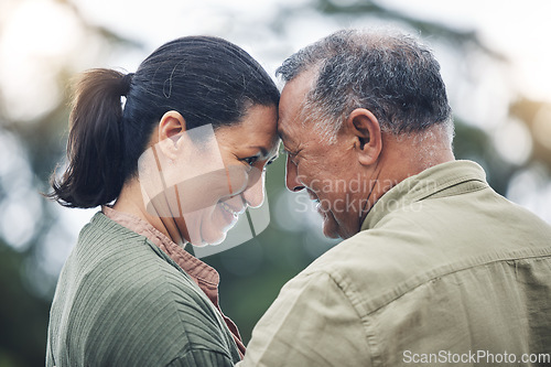 Image of Outdoor, forehead and senior couple with love, retirement and happiness with care, bonding and romantic. Romance, happy old woman and elderly man with commitment, joy and loving together in a park