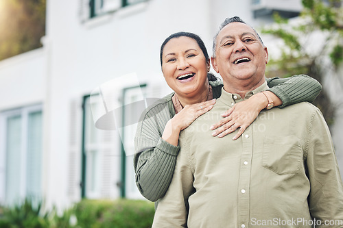 Image of Love, portrait and senior couple embracing in the backyard garden of their family home. Happy, smile and elderly man and woman in retirement hugging and bonding together outdoor of their modern house