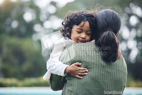 Image of Love, trust and child hug mother at outdoor park bonding for care and happy for quality time together in nature. Smile, mama and kid embrace parent or mom for happiness and support in mockup space