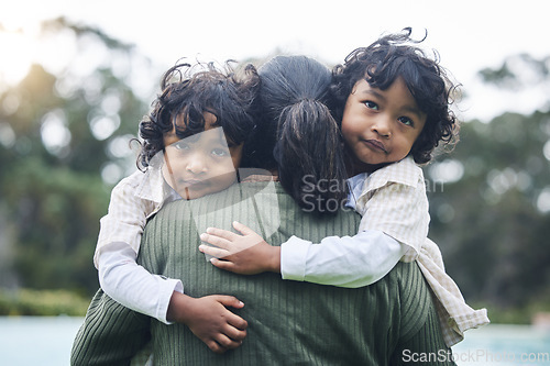 Image of Love, care and children hug mother at outdoor park bonding for trust and happy for quality time together. Smile, mama and kids embrace parent or mom for happiness and support in mockup space