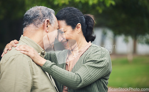 Image of Love, affection and senior couple in nature in an outdoor park with care, happiness and romance. Happy, smile and elderly man and woman in retirement embracing and bonding together in a green garden.