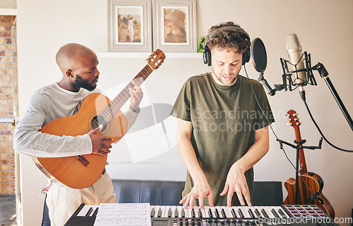 Image of Music, piano and friends with guitar recording in home studio together. Electric keyboard, instrument and microphone of singer with teamwork, creative men and artists in production of acoustic sound