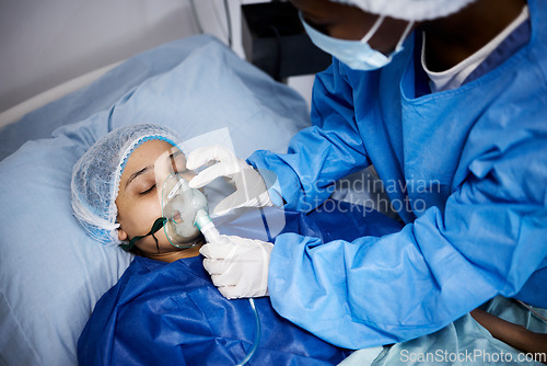 Image of Doctor, hospital bed or woman with an oxygen mask, anesthesia or operation for healthcare recovery. Medical, ventilation or sick patient with breathing equipment in coma for respiratory in emergency