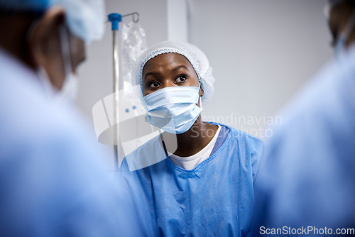 Image of Surgery, teamwork or surgeons with mask for emergency, accident or healthcare in hospital clinic. Doctors, medical or African nurses in surgical collaboration helping in operating room with support