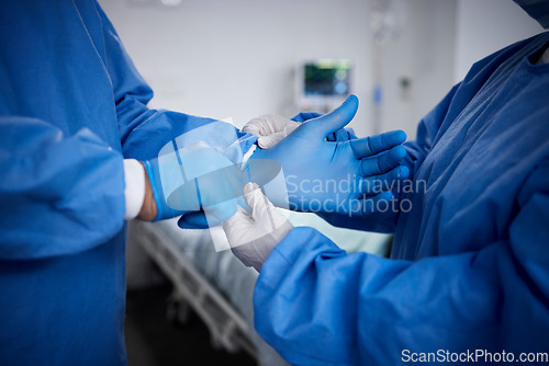 Image of Surgery, hands or surgeons with gloves for operation procedure or healthcare crisis in hospital. Prepare, medical team tools or closeup of doctors helping in operating room in clinic with protection