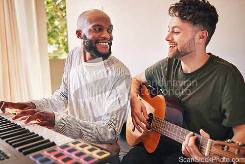 Image of Friends, band and smile with piano, guitar and song production in home studio together. Happy men, musicians and collaboration with keyboard, acoustic instrument and creative talent for performance