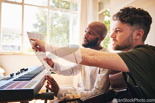 Image of Music notes, piano and friends with guitar in home together to practice reading. Electric keyboard, acoustic instrument and musician team, creative men and artists with paper for production of sound.