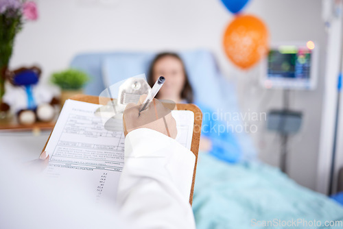 Image of Doctor, patient and writing on clipboard in a hospital with a sick woman in bed for a report. Healthcare, medical staff and insurance with information, questions or screening consultation for person