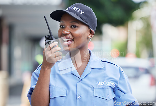 Image of Security woman, radio and portrait in city, communication and contact for backup, support or safety in street. African protection agent, audio tech and talk with info in metro, cbd or road for crime