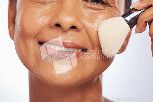 Image of Brush, portrait or happy woman in studio for cosmetics powder, beauty or facial grooming treatment. White background, smile or face of female model applying foundation product in self care routine