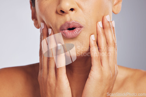 Image of Lips, pouting or hands of a woman for skincare, beauty or dermatology wellness. Mouth, anti aging and face or manicure of a model for cosmetic nails, glow or wow isolated on a studio background