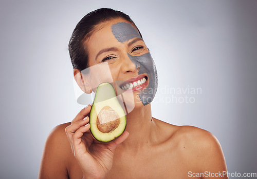 Image of Woman, skincare with avocado and face mask with clay, charcoal or natural beauty product for wellness, detox or nutrition. Fruit, portrait of girl with healthy, green cosmetics or vegan facial care
