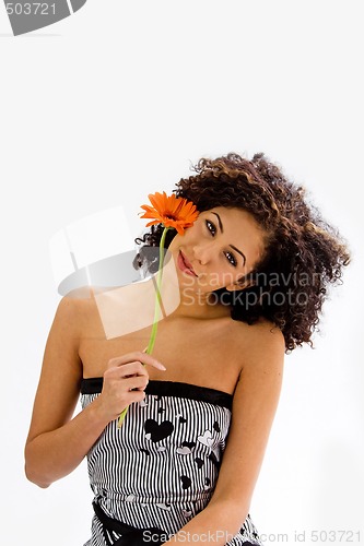 Image of Young girl with flower