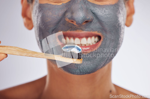 Image of Beauty, face mask and teeth, woman and toothbrush with dental health and cosmetics isolated on white background. Facial, dermatology and oral care, female model with hygiene, grooming and skincare