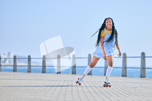 Image of Skating, portrait and woman with happiness on the promenade for fun and weekend skate. Summer, smile and person with mockup while on roller skates for a trendy activity, hobby and vacation in street