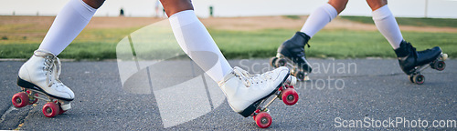 Image of Legs, roller skates and shoes of friends on street for exercise, workout or training outdoor. Skating, feet of people and sports on road to travel, journey and moving for freedom, hobby and fitness