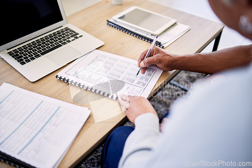 Image of Couple, tax documents and hands with writing, financial review and planning for budget in home. People, laptop and paperwork for insurance, compliance or payment for bills, debt or savings at desk