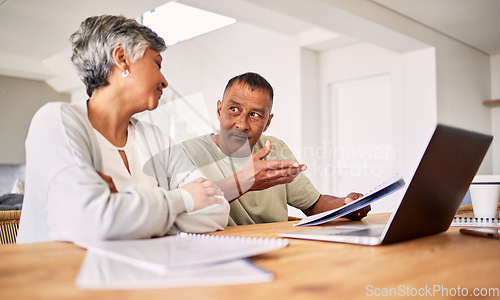 Image of Senior couple, taxes and laptop with talk, documents and planning with financial review, teamwork and home. Mature man, woman and computer with paperwork for budget, audit and compliance in house