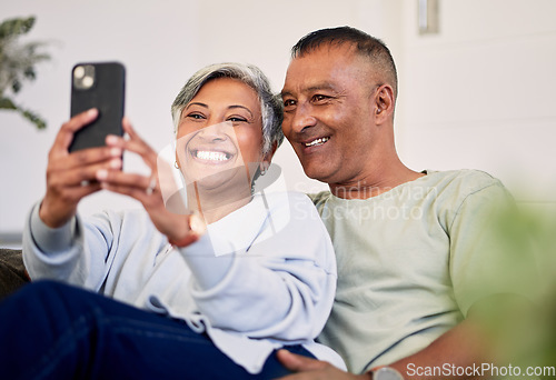 Image of Love, selfie and happy senior couple bonding, relax and post memory picture, smile and enjoy retirement free time. Social media upload, home and elderly man, old woman or people pose for photo
