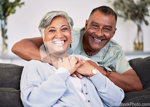 Image of Portrait, happiness and senior couple on sofa with hug for quality time in living room to relax. Smile, marriage and elder man or woman with embrace on couch with love or care for bonding together.