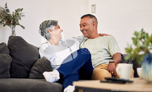 Image of Love, smile or laughing senior couple bonding, relax and enjoy quality time together, funny conversation or chat. Lounge communication, marriage humour or elderly people laugh at home retirement joke