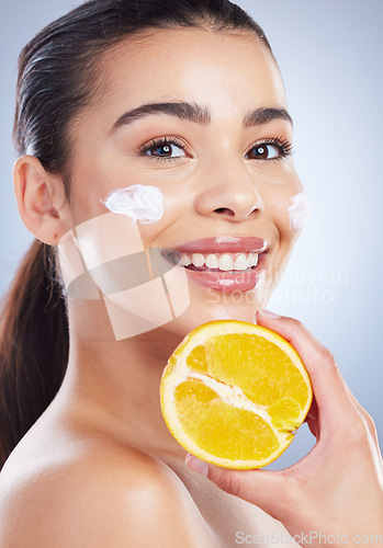 Image of Lemon, skincare and woman portrait with face cream in studio for wellness or cosmetic mask on grey background. Fruit, smile and lady with dark spots facial, melasma or acne prevention or sunscreen