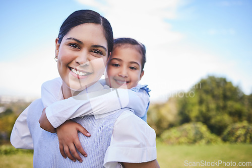 Image of Happy mother, portrait and hug with child for quality time, bonding or love together in nature outdoors. Mom smile with daughter in piggyback enjoying summer weekend, holiday or vacation in the park