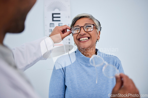 Image of Glasses, doctor or happy old woman in eye test assessment for healthcare, wellness or vision examination. Smile, visual or mature client testing a optician or optometrist in optometry consultation