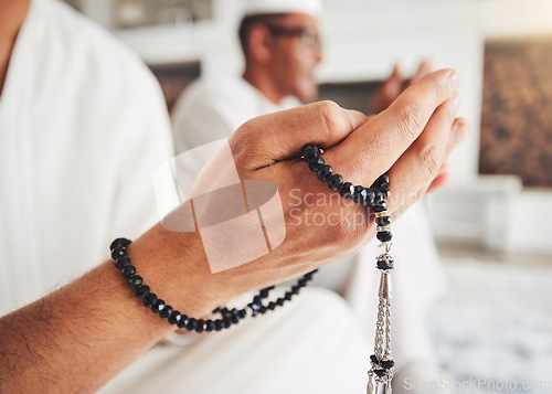 Image of Prayer beads, Muslim person hands and Islamic faith, worship and trust in God with peace and religion. Devotion, spiritual and Islam with gratitude, respect and closeup with praying in the Mosque