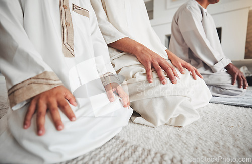 Image of Prayer, muslim and islamic with hands of family on living room floor for eid mubarak, God and worship. Quran, hope and Ramadan with spiritual people praying at home for faith, religion and gratitude