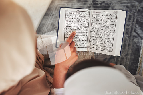 Image of Prayer, muslim and Quran with child and learning for eid mubarak, God and worship. Islamic, hope and Ramadan with hands of family teaching arabic on mat at home for faith, religion and gratitude