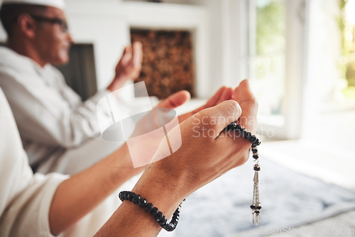 Image of Muslim pray, beads and hands, Islamic faith with worship and trust in God with peace and religion. Trust, spiritual and Islam with gratitude, respect and people praying in the Mosque with devotion