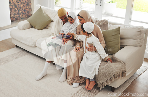 Image of Family house, children or Muslim parents with tablet for elearning, Islamic info or studying in Allah or God. Child development, dad or Arab mom with young kids reading online ebook on social media