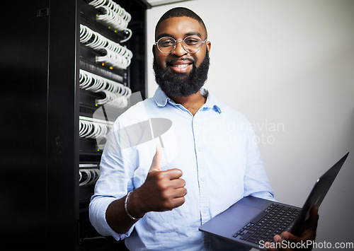 Image of Server room, laptop and thumbs up with technician man for internet connection and software programming. Engineer black person with technology and thank you for cybersecurity system in data center