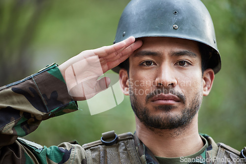 Image of Army, man and salute portrait in military of a veteran with security, protection and battle. Male person, soldier and serious face with surveillance, hero and war leader with camouflage in nature